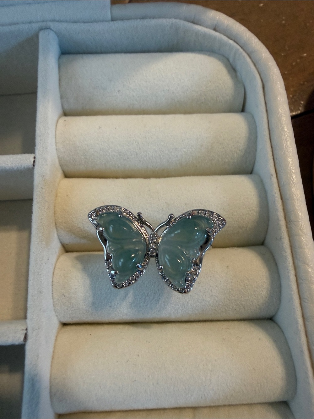 Silver Butterfly Ring with Light Green Gemstone Accents